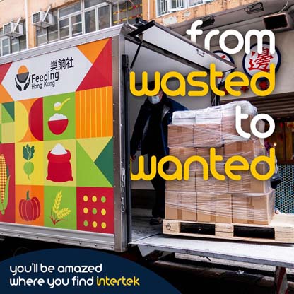 Boxes of food being loaded into a delivery truck for