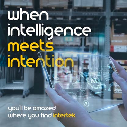 A person holding a futuristic see-through tablet in a warehouse